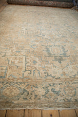 Vintage distressed Heriz carpet with worn beige geometric blossoms and Samovar Turtle border motif.