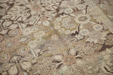 Close-up of the distressed Bibikabad carpet's pile, showing even wear down to the knot heads.