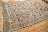 Softly worn vintage Bibikabad carpet with a floral trellis in brown and platinum tones.