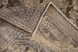 Folded corner of a vintage Bibikabad rug showing its hand-knotted back and secured selvage.