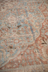 Detailed view of the mostly even wear and hand-knotted pile on a vintage Tabriz rug.