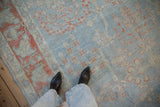 Perspective view showing the even, low-pile wear on a distressed vintage Mahal carpet.