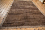 Vintage Tulu carpet with shaggy pile, horizontal coffee brown and beige striations.