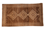Distressed vintage Kars carpet with brown diamond medallions and abrashed ground, 5'2