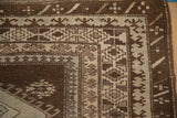 Close-up of the reciprocating pawn design motif in the geometric borders of a Kars carpet.