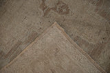 The woven back and secured side cord of a vintage hand-knotted Turkish Oushak carpet.