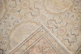 Hand-knotted foundation and woven back of a distressed vintage Kaisary carpet.