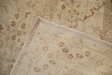 Back of a vintage Kaisary carpet showing the hand-knotted weave and intact side cord.