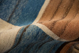 Vintage Indian Gabbeh rug pile displaying dusty blue, copper brown, and ivory abrashes.