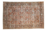 Vintage Distressed Mahal carpet with terracotta, dusty blue floral motifs, and a Herati border, 7'2