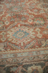 Distressed Mahal carpet texture featuring copper, dusty blue, beige floral patterns, visible foundation.