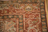 Worn pile texture of vintage Heriz rug, with brick red, green, ivory abrashes.