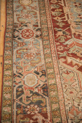 Vintage Distressed Heriz rug's border showcasing Samovar Turtle motif with abrash in dusty teal, brick red.