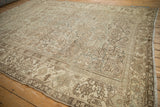 A view across the vintage Mehrivan rug, showing the even wear and intricate geometric allover design.