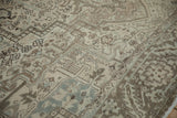 Distressed Heriz rug texture, geometric motifs in sand, coffee brown, and pale blue.