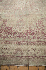 Mostly even wear across the knot heads of an antique distressed Kerman carpet.