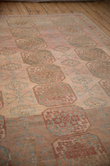 A vintage Ersari carpet showing unique dye lot abrashes across its geometric gul pattern.