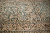 Wide main border of distressed Malayer carpet, floral vines and palmettes on pale coral.