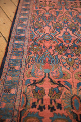 A close view of the vintage Lilihan rug's plush wool pile and dark navy blue side cord selvage.