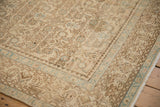 Distressed Hamadan carpet detail with geometric Herati pattern in cream, coffee, powder blue.