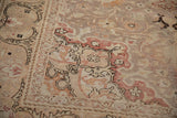 Distressed Kayseri carpet border with faded brick red arabesques and serrated leaf detail.