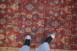 Close-up of the thick pile and allover Herati design on a vintage Kurdish Hamadan carpet.