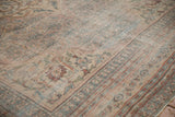 Distressed antique Persian Doroksh carpet showing worn Herati field, foundation, and nuanced abrashes.