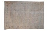 Distressed vintage Mahal carpet with worn curvilinear motifs in muted platinum, ivory, teal.