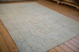 Distressed vintage Mahal carpet detail showing subtle platinum, beige pattern, and visible knot heads.