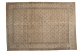 Distressed vintage Tabriz carpet with a tone-on-tone Herati pattern in brown, ivory, and dusty blue.