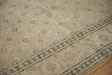 Detail of the Samovar turtle border next to the Herati field on a distressed Tabriz carpet.