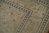 Low, distressed pile of a Tabriz rug showing the Herati field and samovar turtle border.