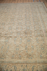 Angled perspective on the distressed Mahal carpet's low pile and rhythmic allover pattern.