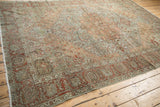 Distressed vintage Bakhtiari corner, olive and burgundy palmette border, with soft fringe.