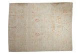Distressed Afghani Moroccan design carpet, allover faded ivory field with pastel landscape motifs. 9x11'9