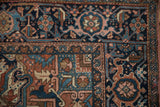Traditional Heriz carpet corner, geometric floral and turtle samovar main border, navy, brick red.