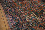 Vintage Heriz carpet main border detail, navy blue and brick red, turtle samovar motif.