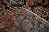 Hand knotted vintage Mehrivan carpet corner, showcasing dense pile, foundation, and fringe.