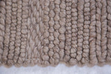 Grayson New Carpet's chunky looped pile texture of natural undyed wool.