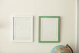 Vintage-style handmade art frames shown in white and mint green options.