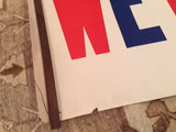 Vintage We Like Ike political poster: torn lower edge, red and blue lettering, wood hanger.