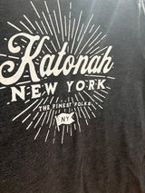 Close-up of the 'Katonah New York' graphic with sunburst on the charcoal tee.