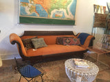 Vintage Phyfe Style Sofa with tangerine orange velvet and intricately carved dark wood frame.
