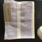 Textured handwoven cotton dish towel with lavender and cream feedsack stripe pattern.