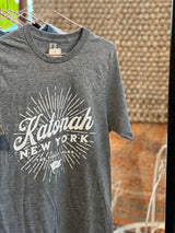 Katonah New York graphic tee in soft heather gray with a white starburst design.