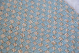 Jackie New Carpet Collection hand-woven light blue and natural jute checkerboard texture.
