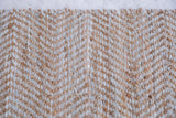 Distinct handwoven chevron pattern with natural jute and light textured recycled leather.