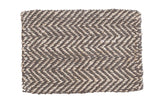 Kema natural jute rug showcasing a dark brown and undyed beige hand-woven chevron pattern, 2x3.