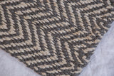 Kema Collection handmade jute rug showing braided gray and natural beige geometric pattern.