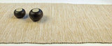 Handwoven cream table runner, 72 inches, with subtle textured undulating weave.